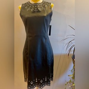 Elle Tahari black buttery leather dress with white lace-like embroidered trim.
